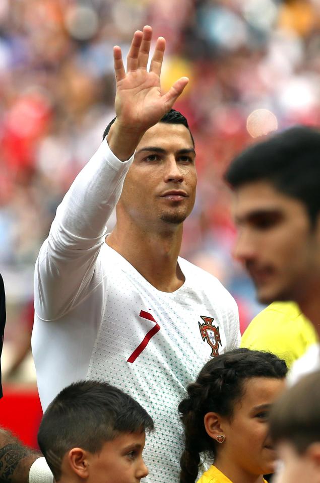  Cristiano waves to his partner in the stands just minutes before scoring the opener for Portugal