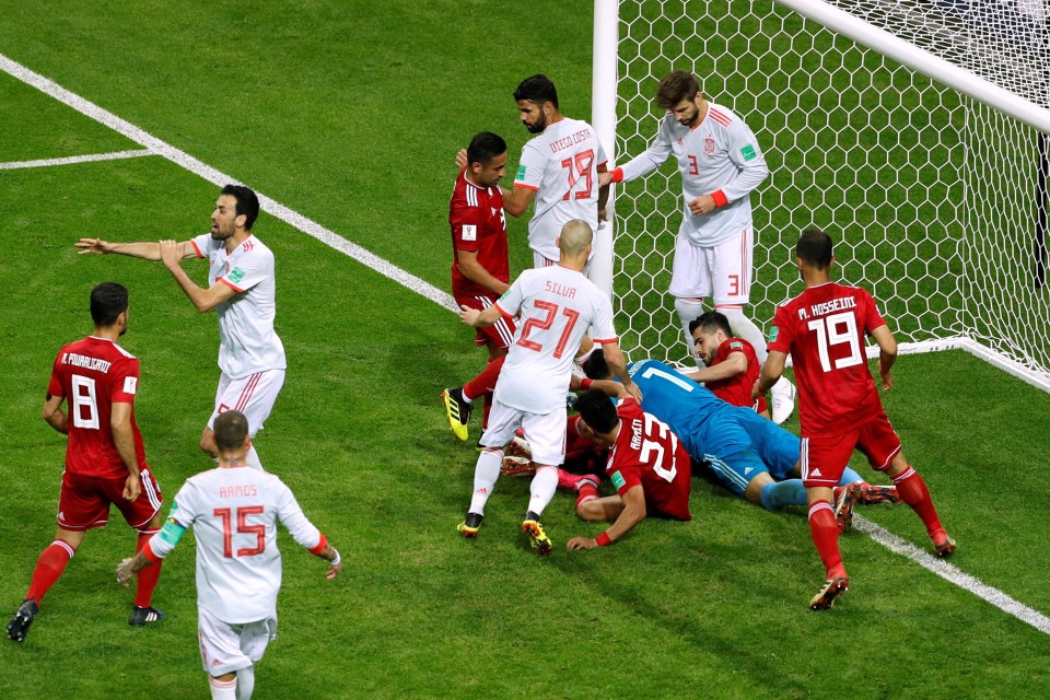 Iran survive a frantic goalmouth scramble in the second half