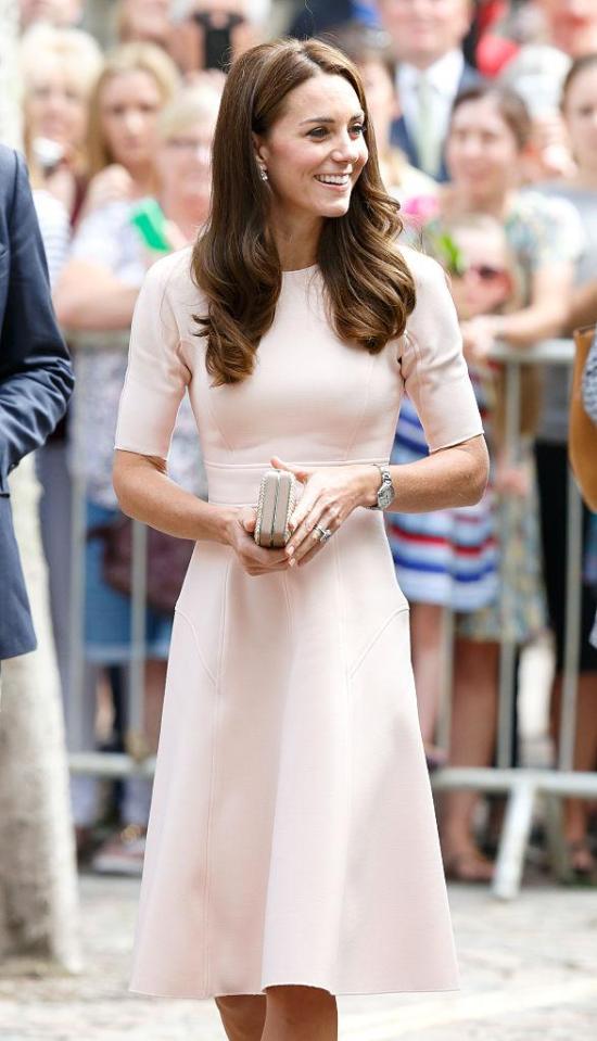  Kate Middleton tends to opt for a small clutch - which she can hold between two hands