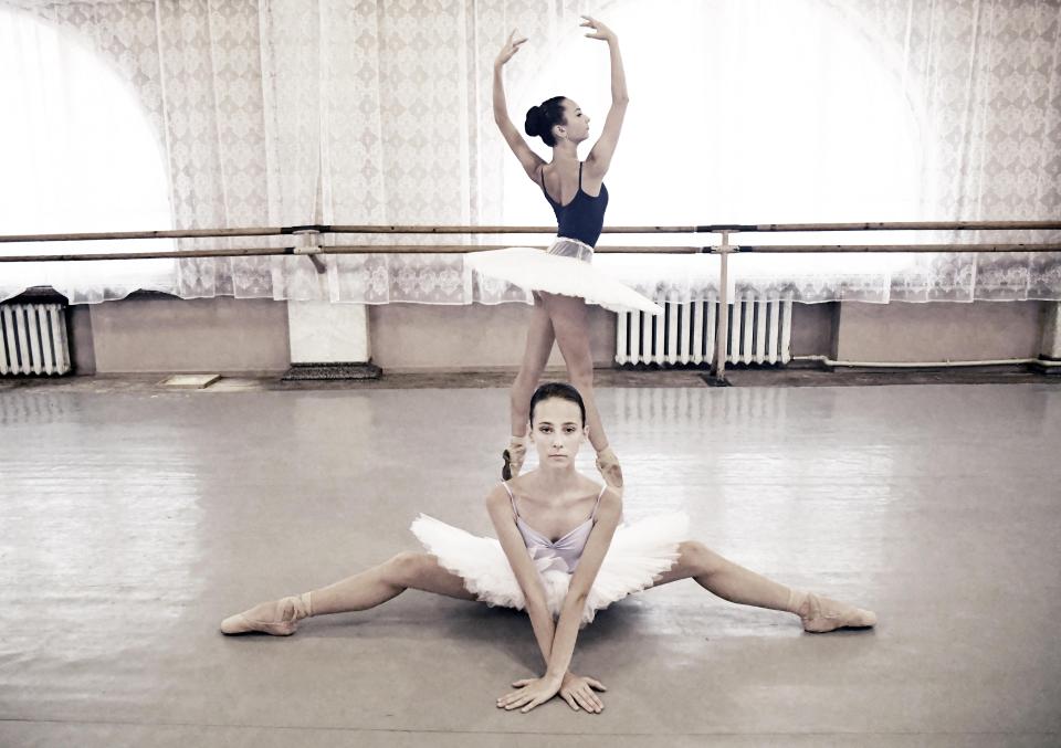  Two young ballet dancers during rehearsal in the Ukraine, despite violence happening metres away