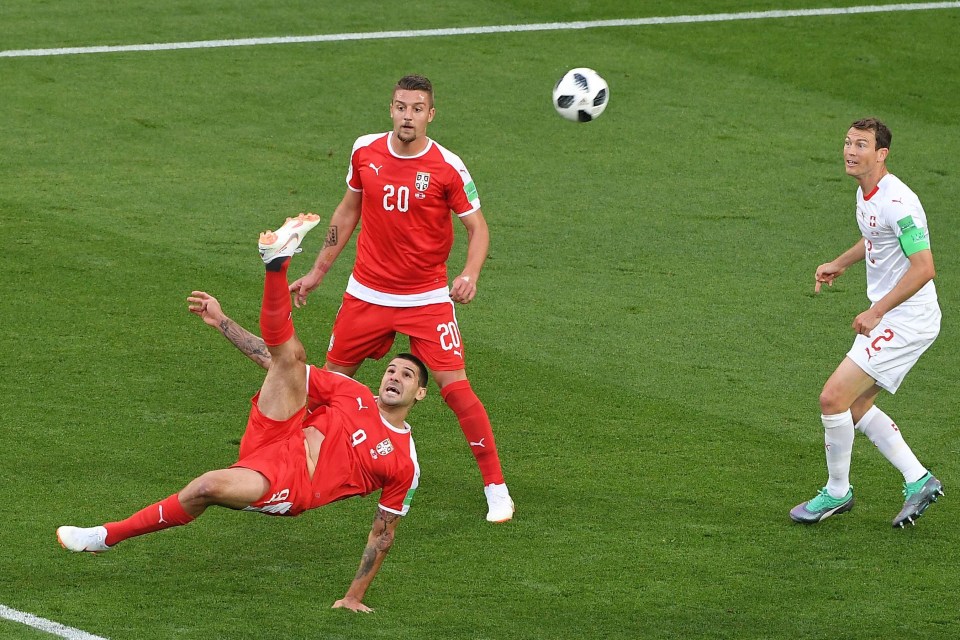 Aleksandar Mitrovic tries an overhead kick in the first half