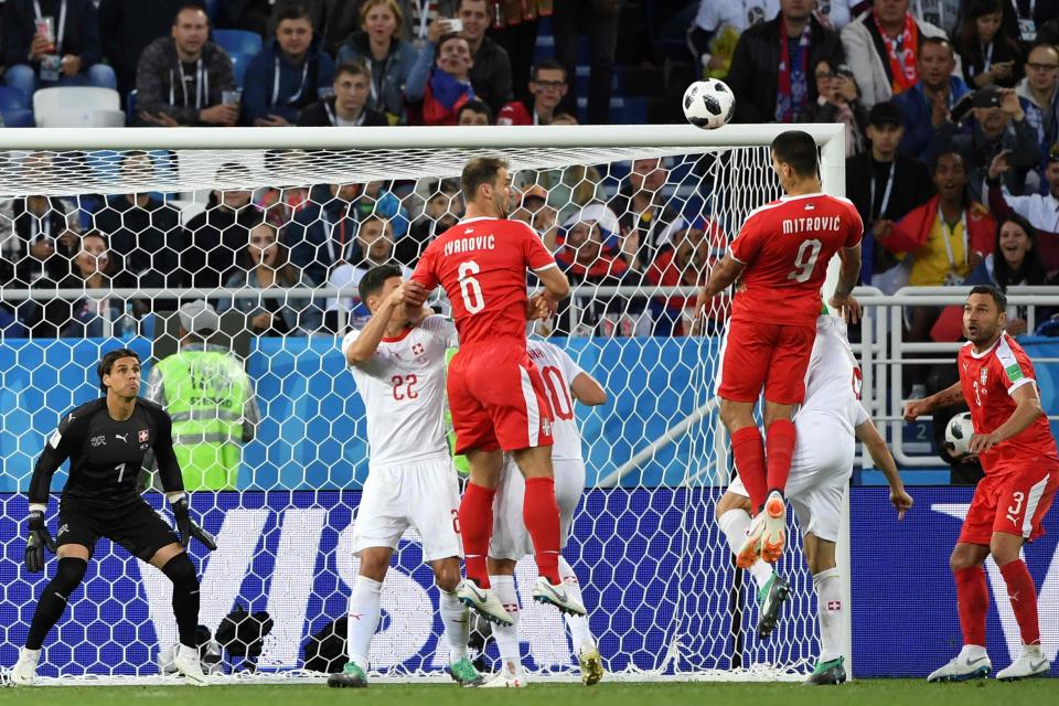  Striker Mitrovic rose to head Serbia into a fifth-minute lead