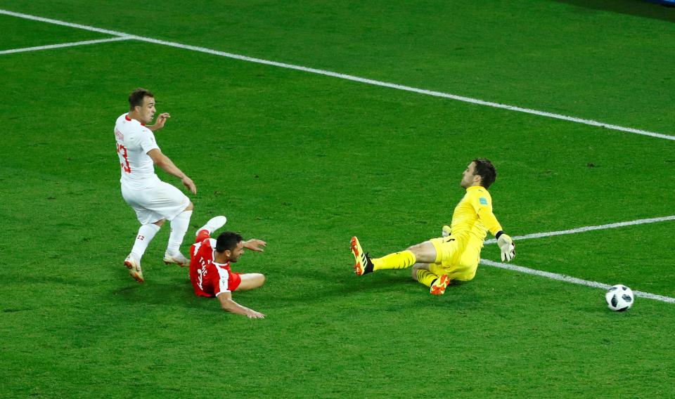  Xherdan Shaqiri slots home a 90th-minute winner