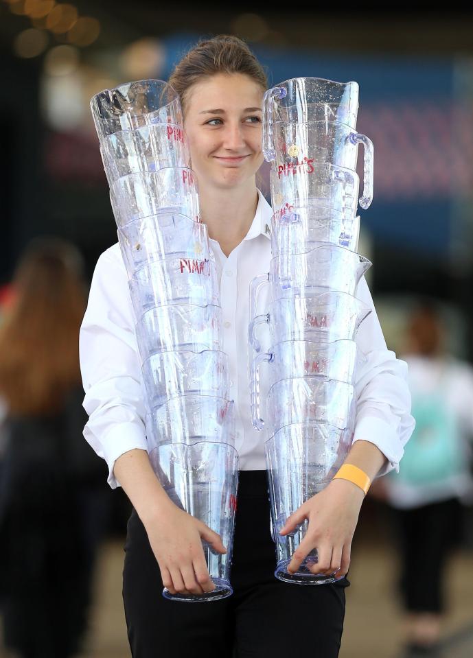  The Pimm's flowed as revellers soaked up the party atmosphere - and tried to stave off the heat