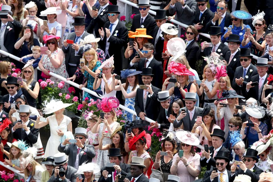  Thousands of punters pulled out their phones to record the Royal procession