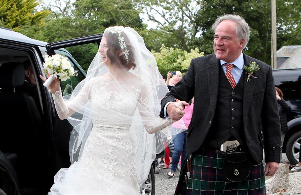  The actress held her dad's hand as she walked