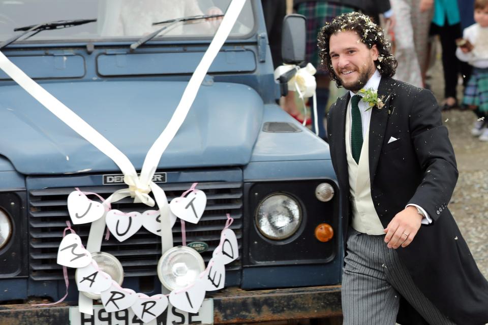  The couple left the church in an old land rover