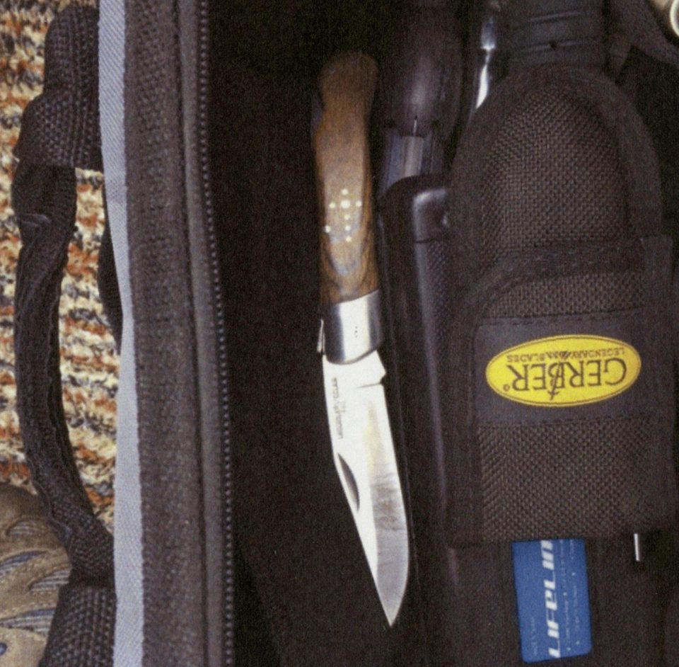  A 4in lock knife and Gerber tool with knife were concealed inside a tool bag