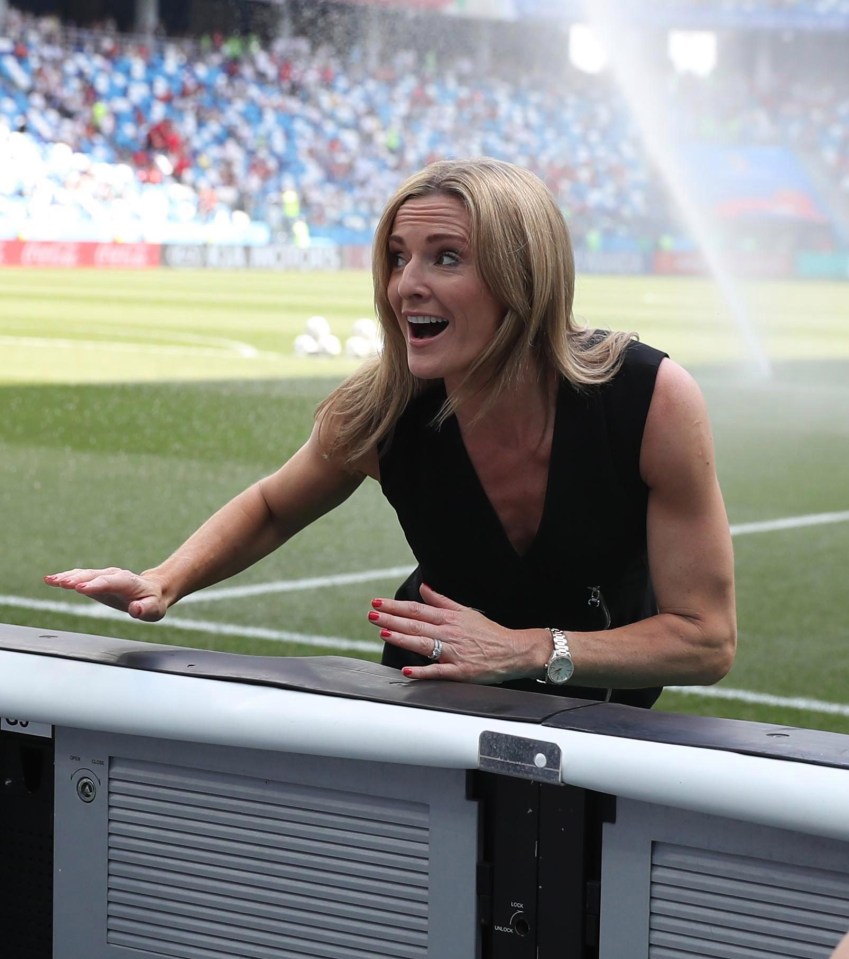 Gabby Logan still managed to get soaked, only this time by a beer in the stands