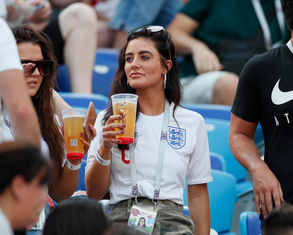  Annie Kilner, girlfriend of Kyle Walker, enjoys a cold pint in the stadium