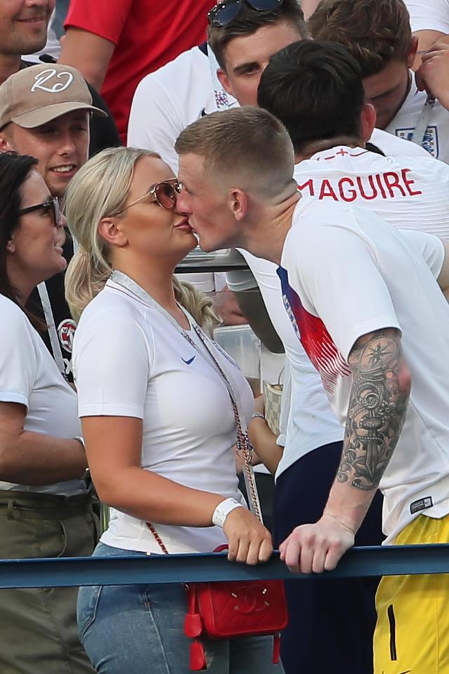  Jordan Pickford kisses girlfriend Megan Davison after the match