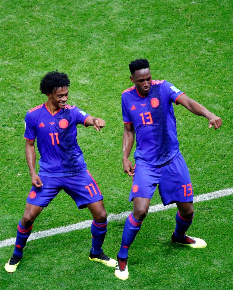  Yerry Mina and Juan Cuadrado pull out a flashy celebration during the match