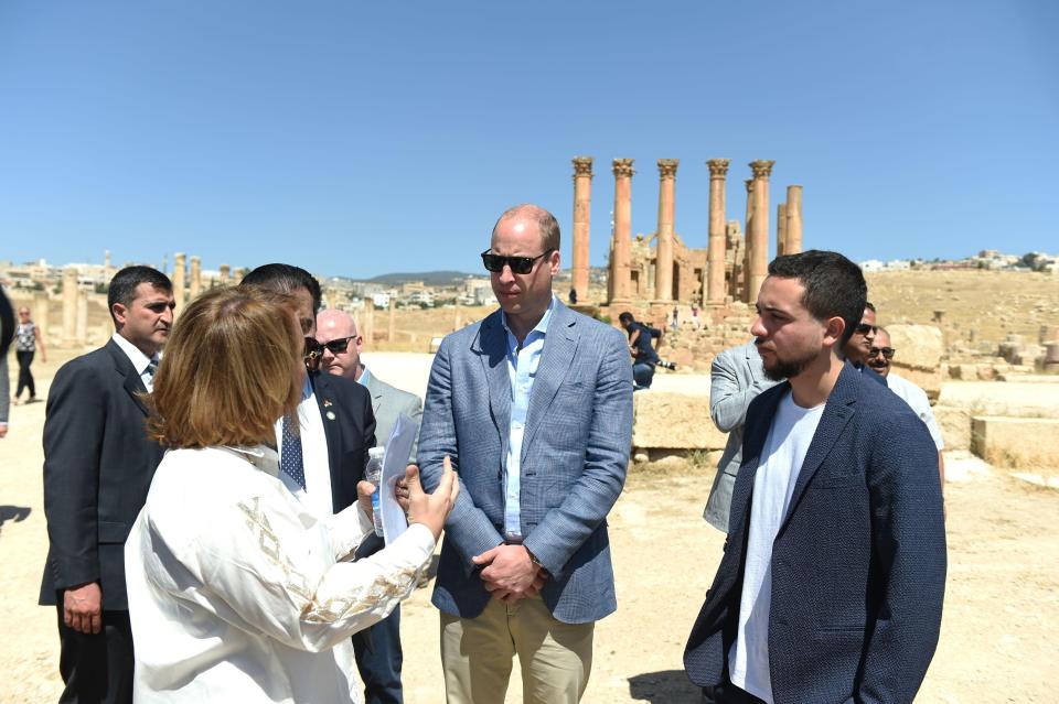  The prince was dressed casually in a blue blazer and light pants on his trip to the ruins