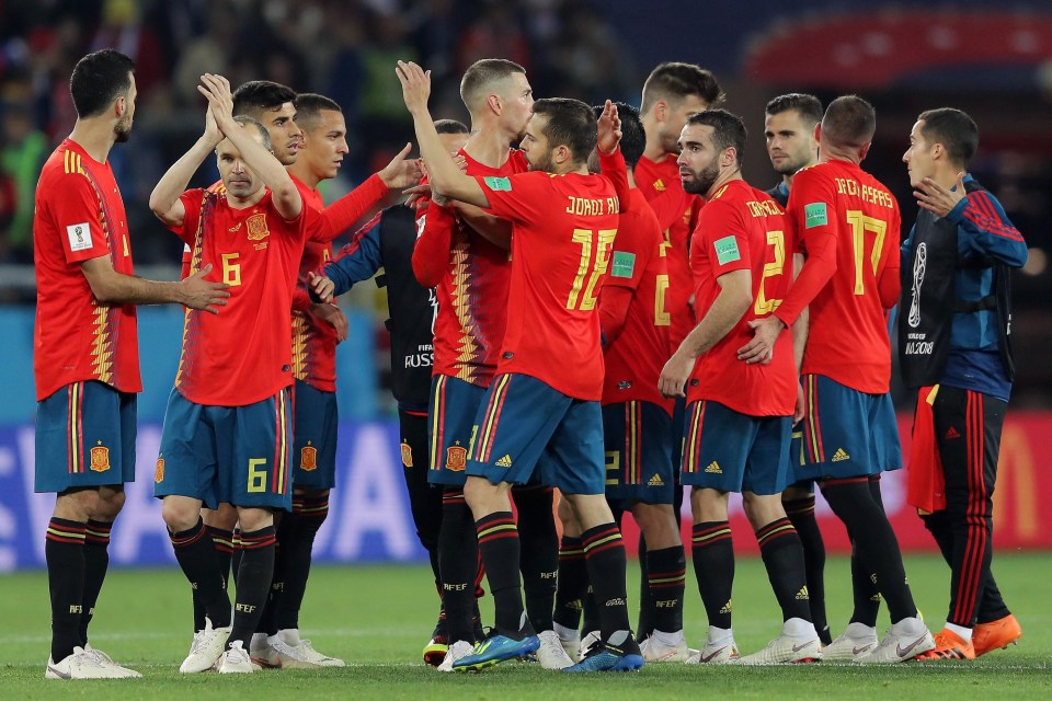 Spain finished above Portugal in Group B after an unimpressive draw with Morocco