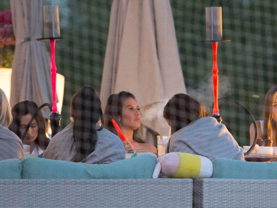  Not up in smoke just yet... Rebekah Vardy enjoys a late night shisha