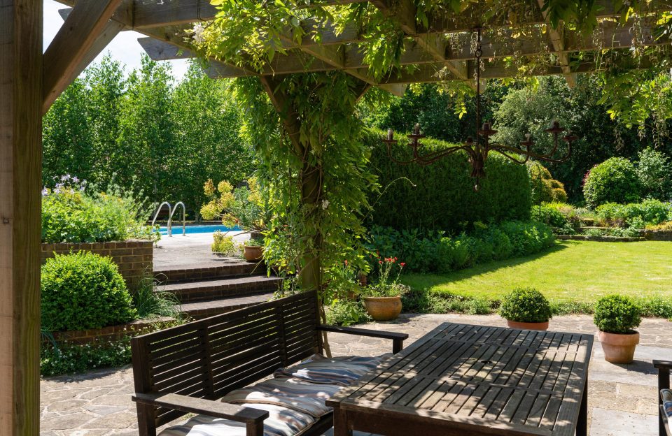  The outdoor dining area by the heated pool is the perfect setup for Summer family days