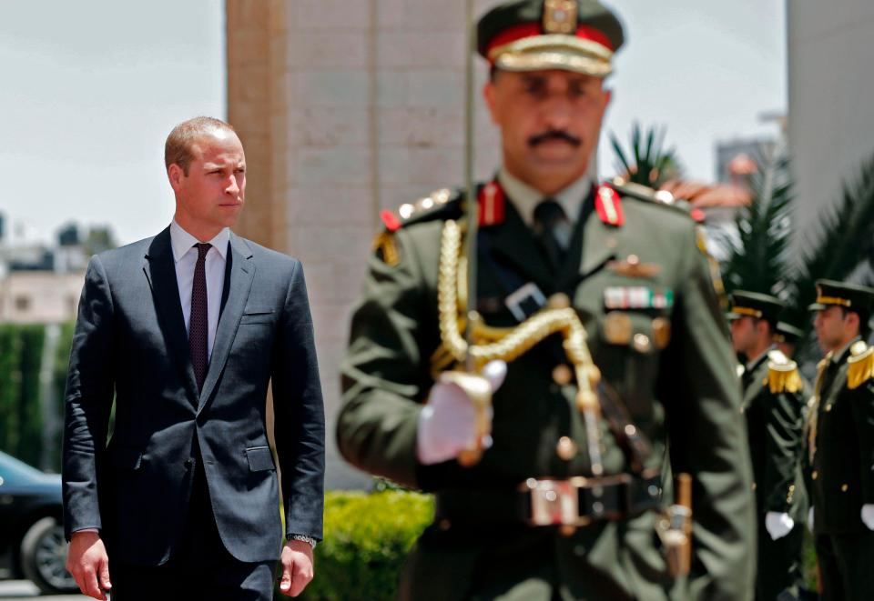  Prince William is seen walking to meet Mr Abbas in the historic West Bank meeting