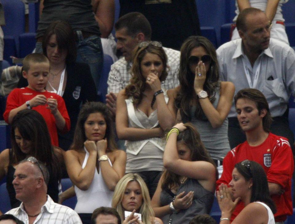  Cheryl and Victoria Beckham watch their fellas play for England