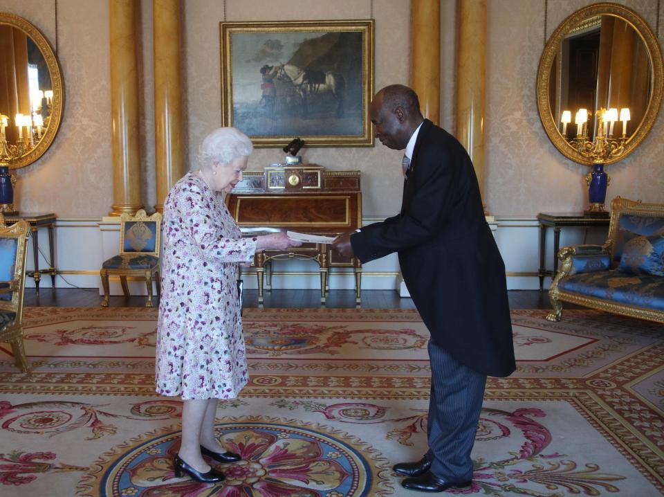  The Ambassador of Zimbabwe Colonel Christian Katsande presents his credentials to the Queen at Buckingham Palace yesterday