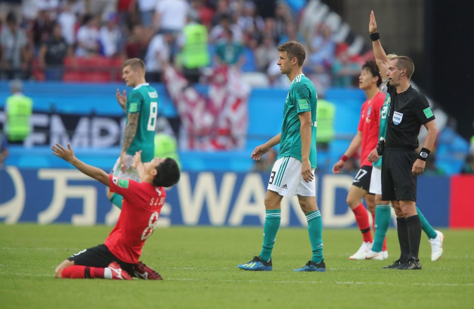  South Korea celebrate their stunning triumph over the four-time champs