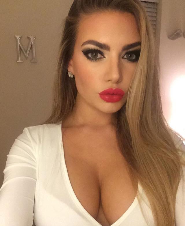  The Love Island star is wearing her favourite red lipstick here, but her hair is longer and darker