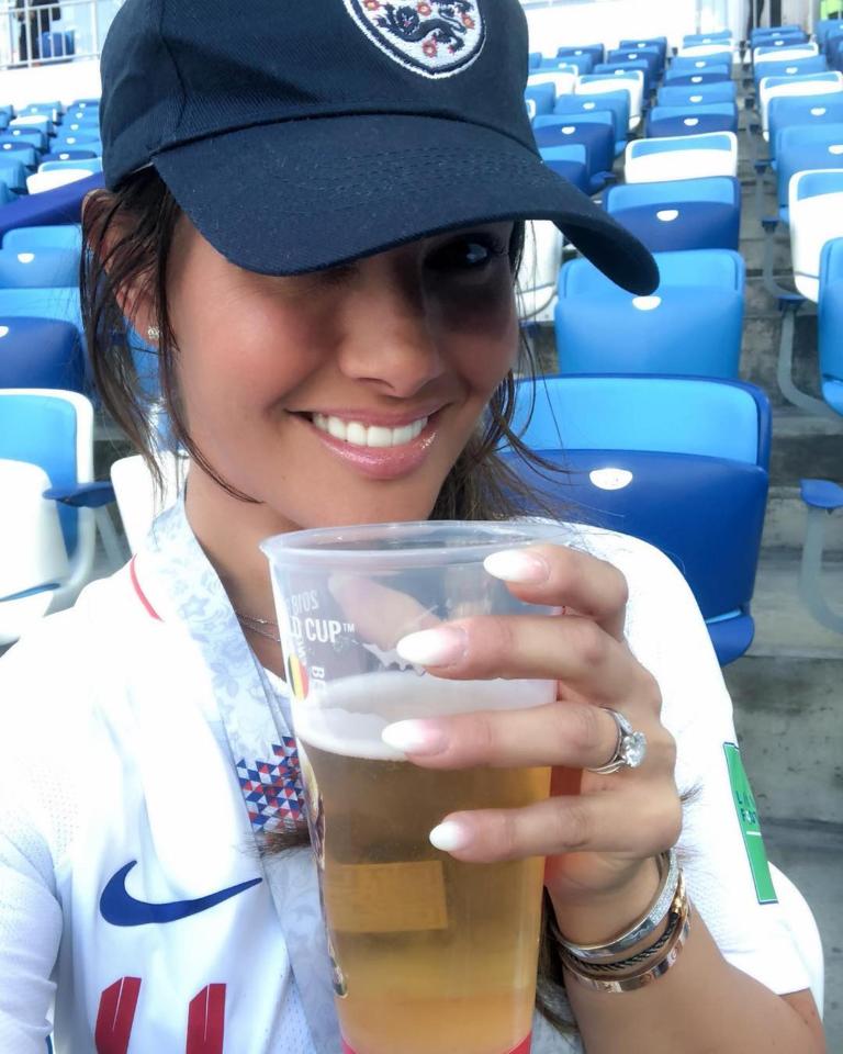  Rebekah Vardy enjoys a beer at the stadium and the Wags were seen out during the week drinking champagne at a swish restaurant in St Petersburg