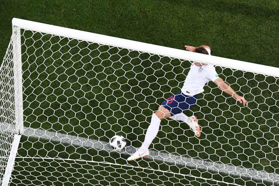 Gary Cahill clears the ball off the line after a blunder by Jordan Pickford