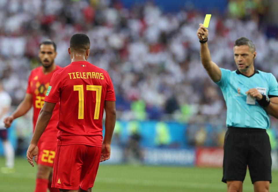 Belgium midfielder Youri Tielemans gets booked for a rough tackle in the first half 