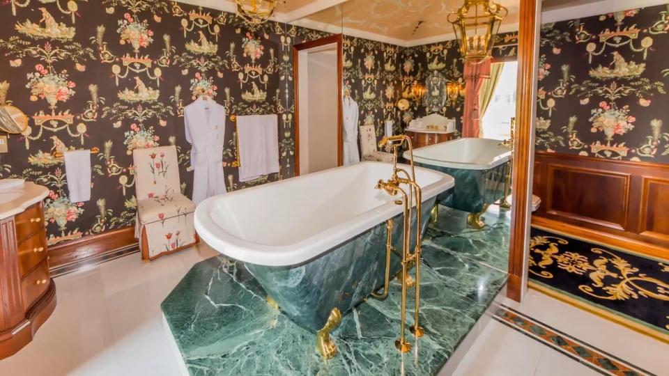  A roll top bath takes pride of place in this bathroom