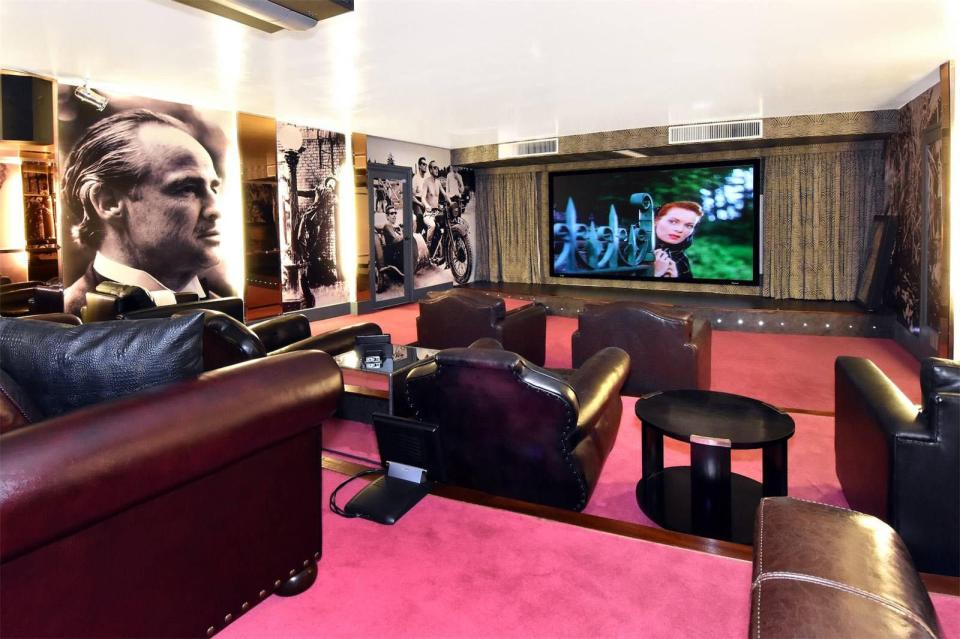  The property boasts its own movie room with scenes from classic films adorning the walls