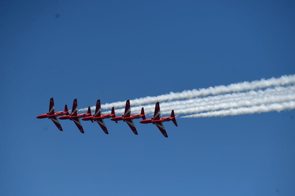 The Royal Air Force Aerobic Team, the Red Arrows, perform an aerobatic display over Llandudno