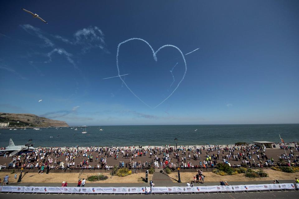 The Red Arrows create a heart in the sky over Llandudno