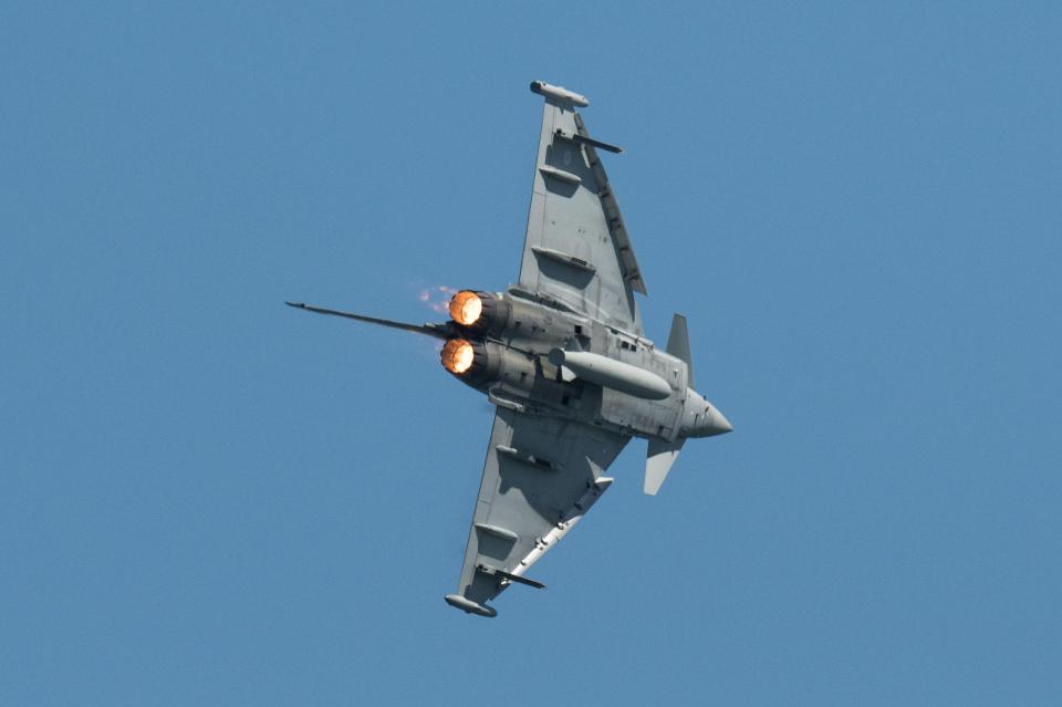 A Royal Air Force Typhoon aircraft performs an aerobatic display during the national Armed Forces Day celebrations at Llandudno