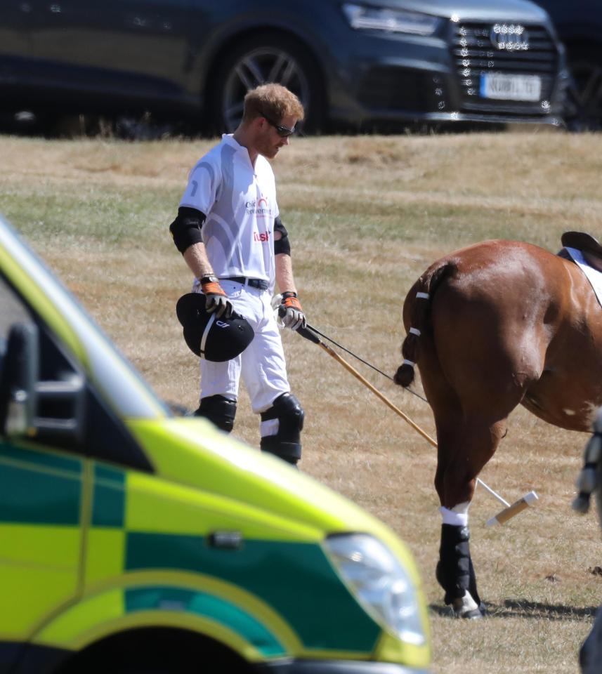  Meghan arrived to cheer hubby Prince Harry play in the sweltering heat