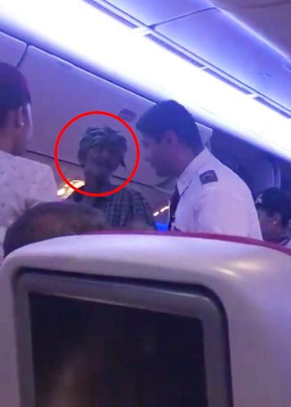  This beggar was filmed asking passengers for money on a Qatar Airways flight