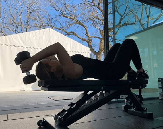  Kate in front of the bi-folding windows in the gym area