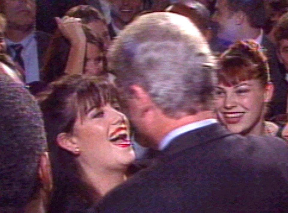  Clinton greets Monica Lewinsky at a fundraising event in October 1996