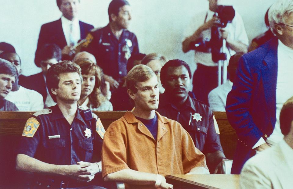  Dahmer is pictured in court in 1991 after his 13-year killing spree was ended