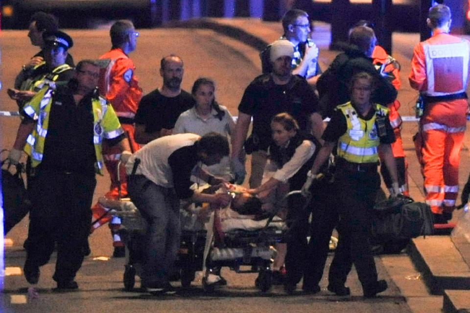  Paramedics and survivors aid victims of the London Bridge terror attack on June 3, 2017