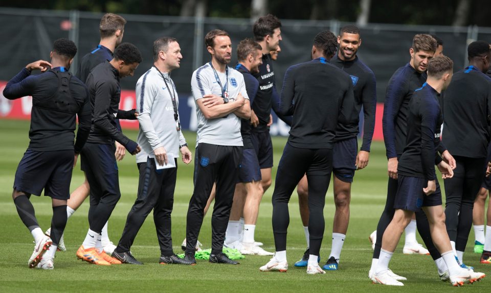  The lads gather round boss Gareth Southgate during a break in training