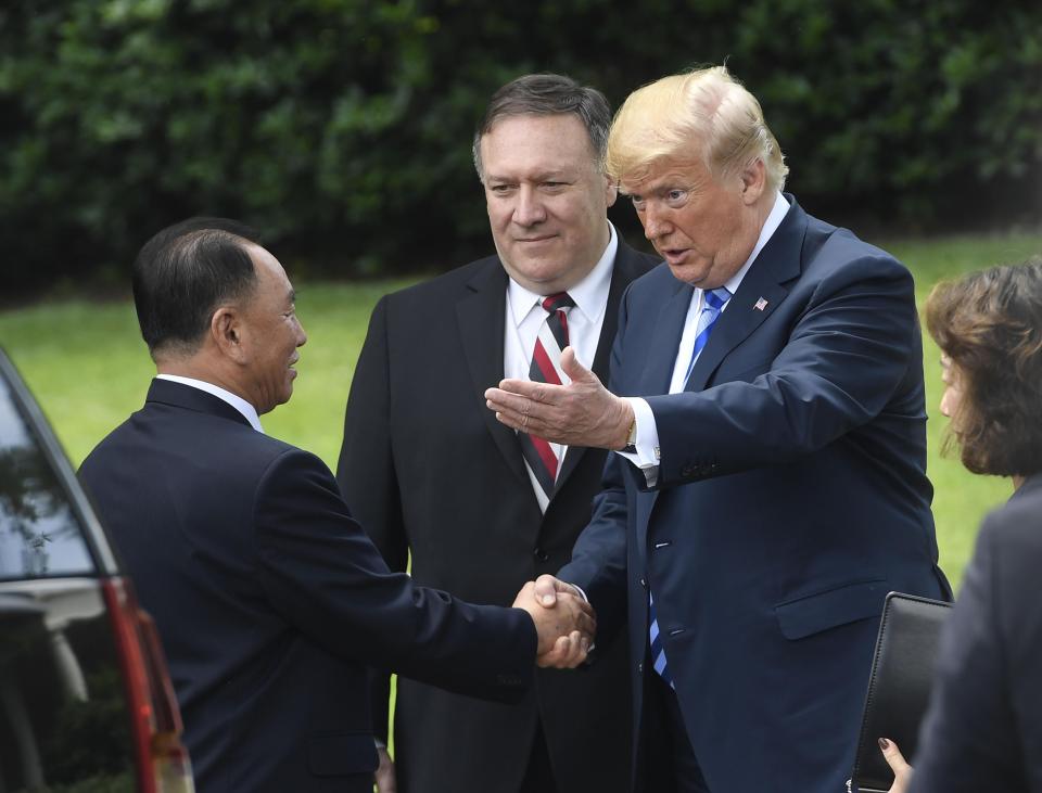  Donald Trump shakes hands with North Korean Kim Yong Chol (L) outside the White House