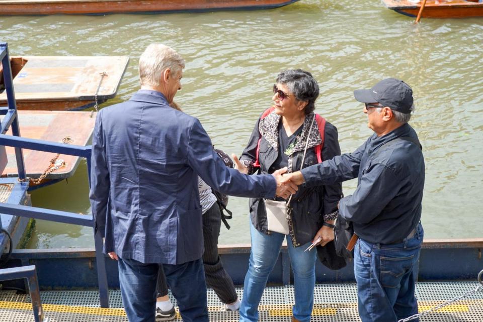  Wenger took time out from the punt to meet fans and sign autographs