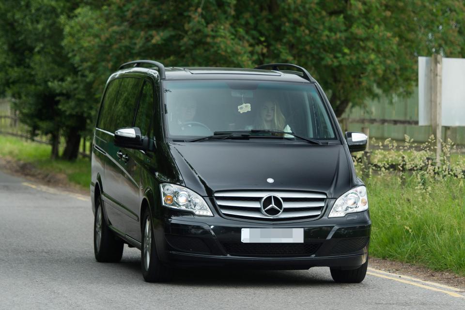  Fred, hidden from view in the back seat, was snapped on his way into Manchester United's training ground this morning to undergo the medical part of his transfer