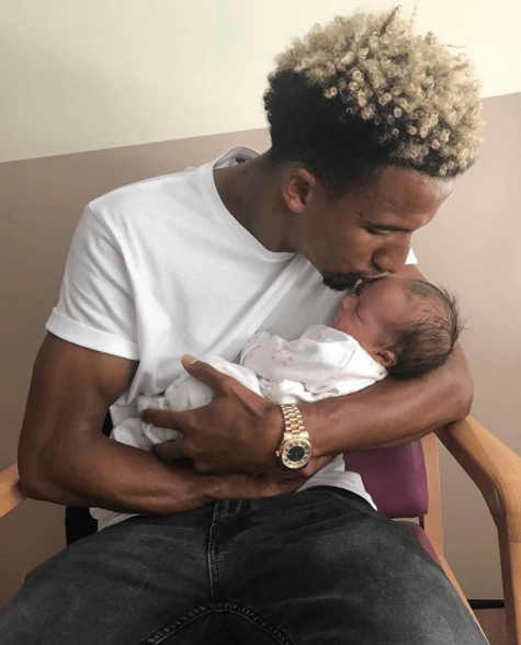  Footballer Scott Sinclair with his new daughter