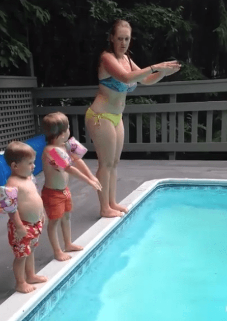  Corina Casanova, from North Carolina, spent an afternoon trying to teach her two boys how to dive into the pool