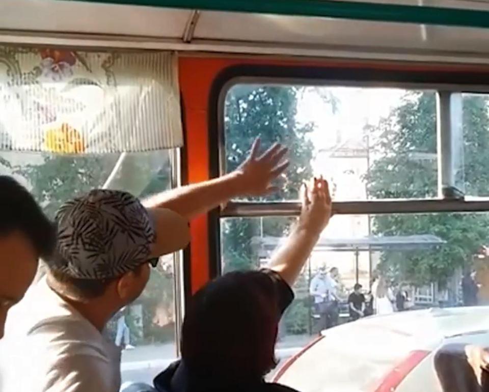  Two commuters battled for several minutes over a window