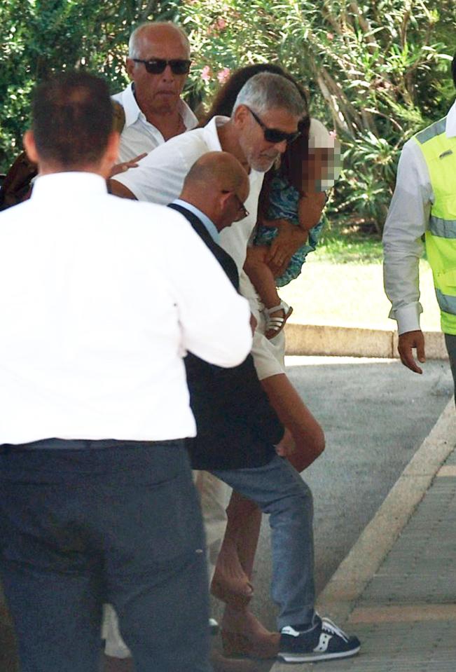  These images of the Clooneys boarding a jet come as his family say he is lucky to be alive following his crash in Sardinia