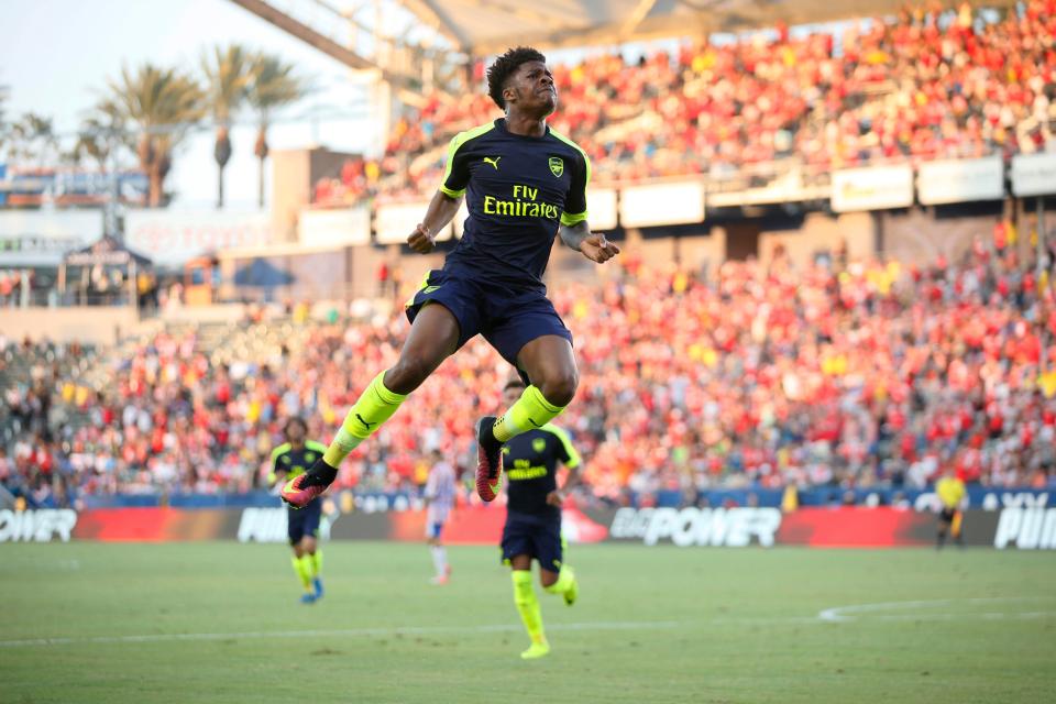  Akpom leaps after scoring against Chivas Guadalajara during the second half of a friendly soccer match in Carson.