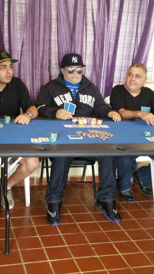  Henry Rosario Martinez, 31, was positioned at a poker table for his funeral