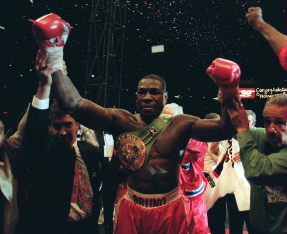  Brune after becoming WBC heavyweight champions following his win over Oliver McCall in 1995